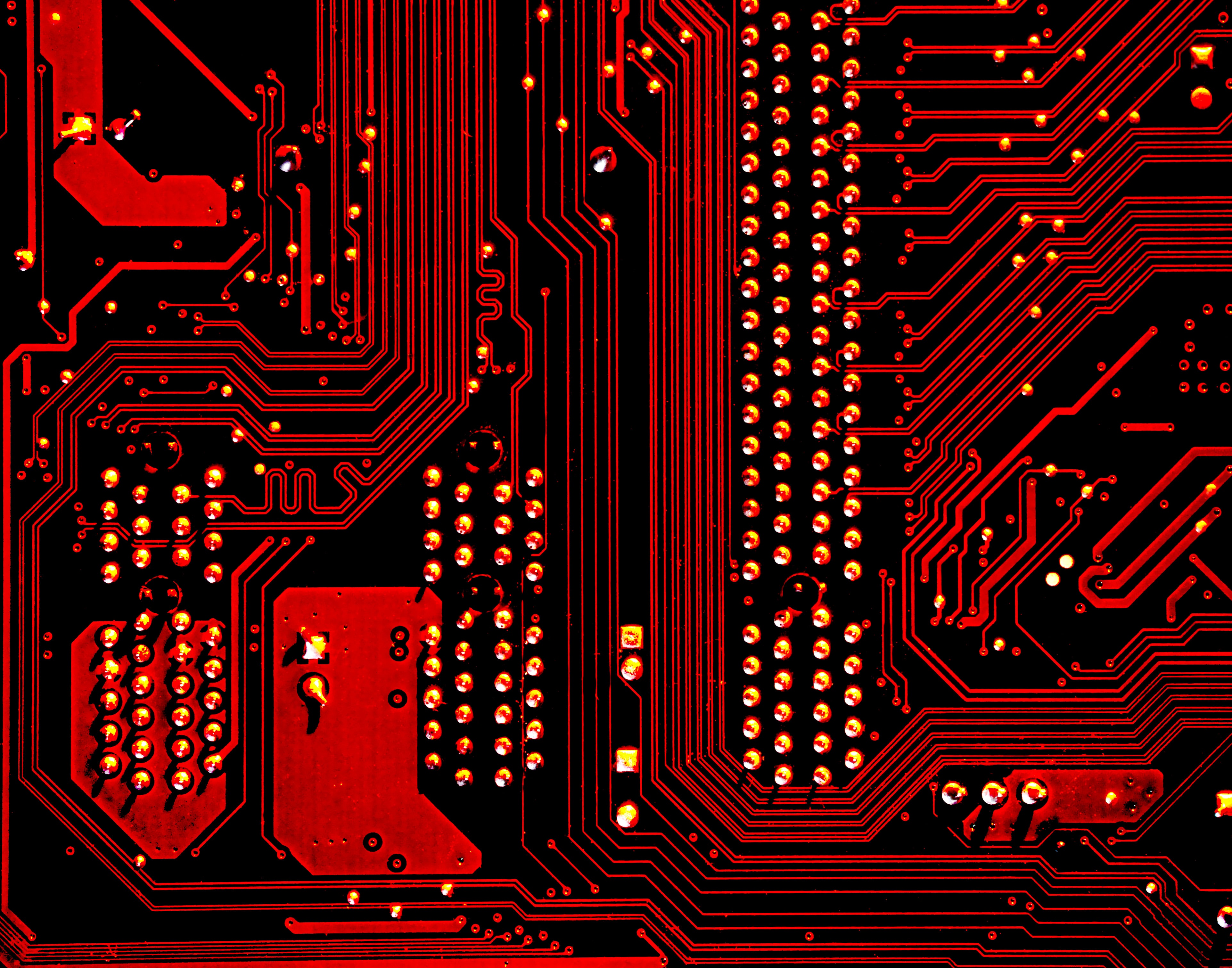 An illustration of a red circuitboard